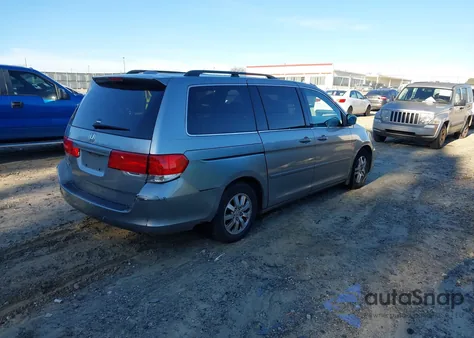 2010 Honda Odyssey Ex-L from USA, damaged, VIN 5FNRL3H76AB073331